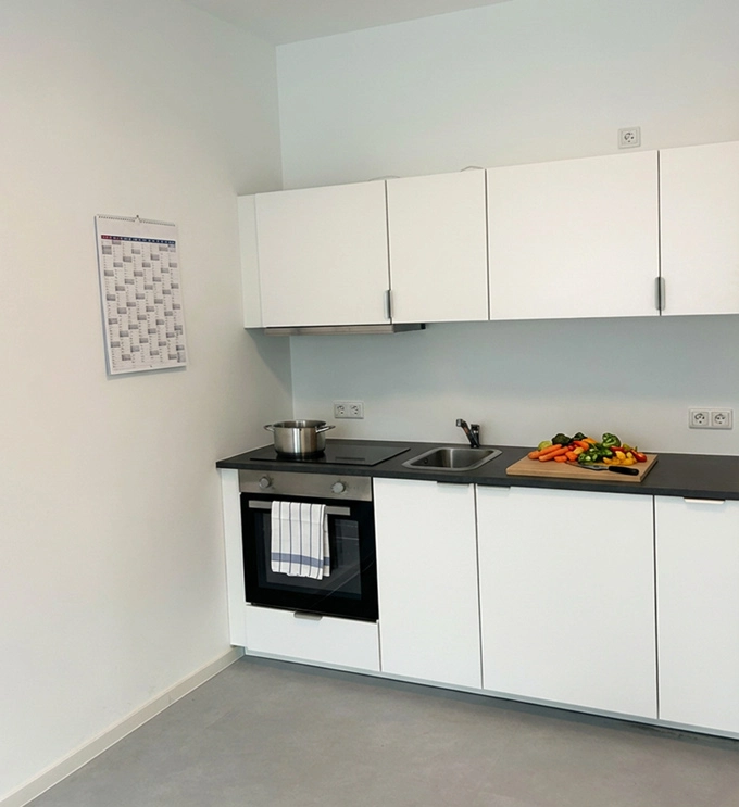 Willkommenshaus_Zimmer-A-Kueche-edt